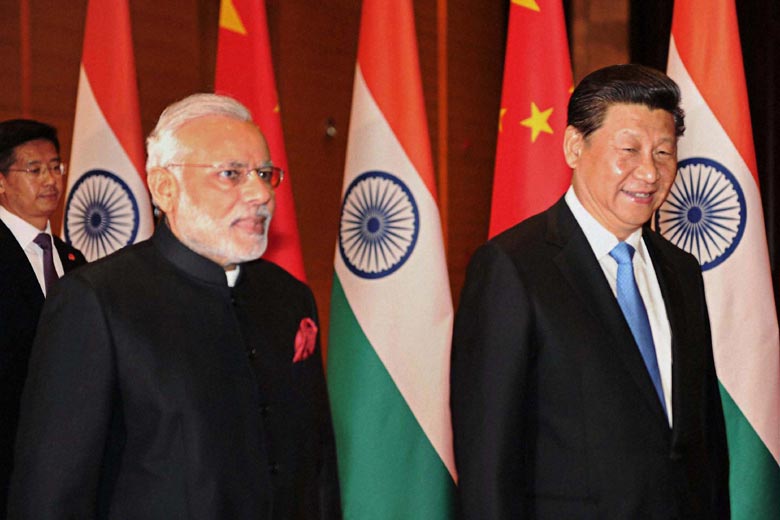 During his talks with Narendra Modi, Chinese President Xi Jinping expressed hope that China and India can trust each other more and control their disputes to avoid weakening bilateral ties. (PTI)