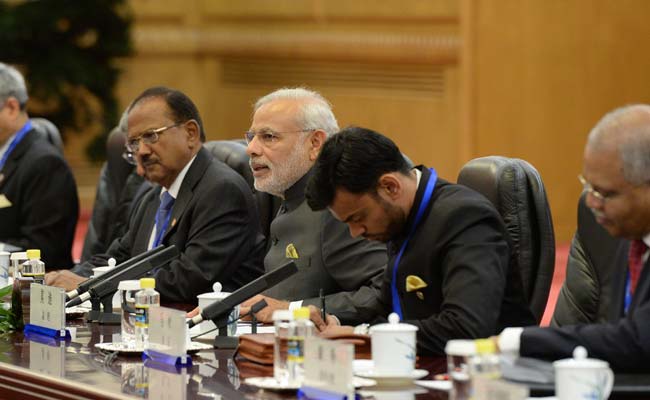 Prime Minister Narendra Modi in a meeting with Chinese Premier Li Keqiang in Beijing on Friday. (Agence Frnace-Presse)