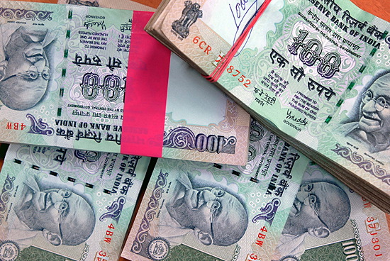 Further reforms to India’s complex system of labor laws can help boost the low female labor force participation rate (photo: Altaf Qadri/AP/Corbis)(Picture from http://fullservice-bigsavings.com/)
