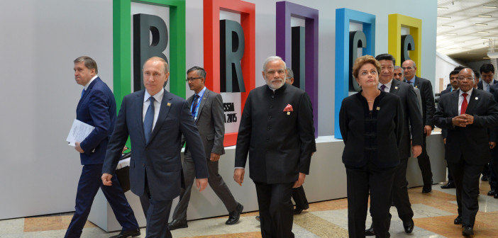 From left: Presidents of Russia Vladimir Putin, Indian Prime Minister Narendra Modi, President of Brazil Dilma Rousseff, President of China Xi Jinping and South African President Jacob Zuma walk for a plenary session during the summit in Ufa, Russia, Thursday, July 9, 2015. (Alexei Druzhinin/RIA Novosti, Kremlin Pool Photo via AP)