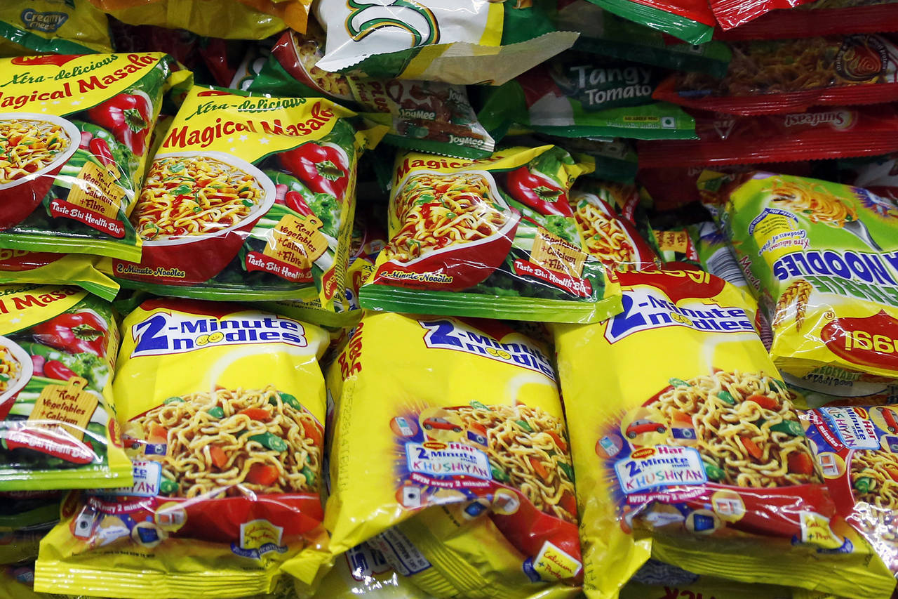Nestlé is fighting Indian regulators in court after food-safety inspectors said they found high traces of lead in its Maggi 2-Minute Noodles and blocked the sale of the product last month. PHOTO: VIVEK PRAKASH/BLOOMBERG NEWS