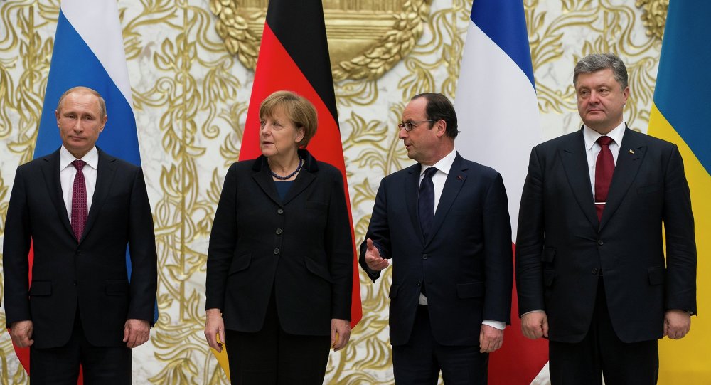 The leaders of France, Germany and Ukraine met in Berlin on Monday to discuss possible ways to resolve the Ukrainian military conflict. © AP Photo/ Alexander Zemlianichenko