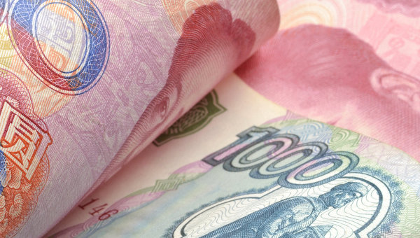 China’s central bank has allowed usage of Russian currency ruble along with yuan instead of U.S. dollar in Suifenhe city on the Sino-Russian border in northeast China. © Fotolia/ Comugnero Silvana