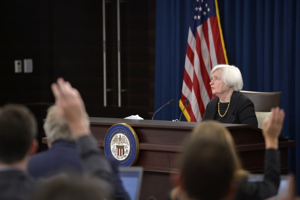 Federal Reserve chief explained that the federal funds rate will stay unchanged considering the weak global economy and low inflation. © Xinhua