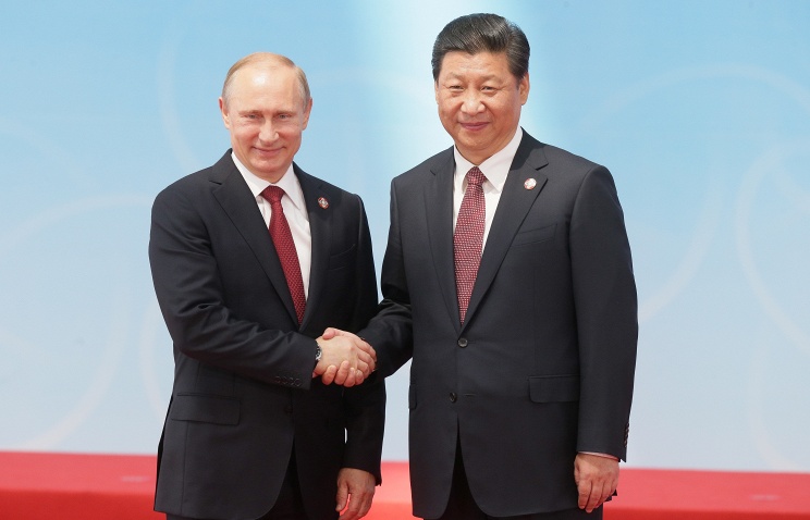 Russian President Vladimir Putin and Chinese President Xi Jinping. © ITAR-TASS/Mikhail Metzel