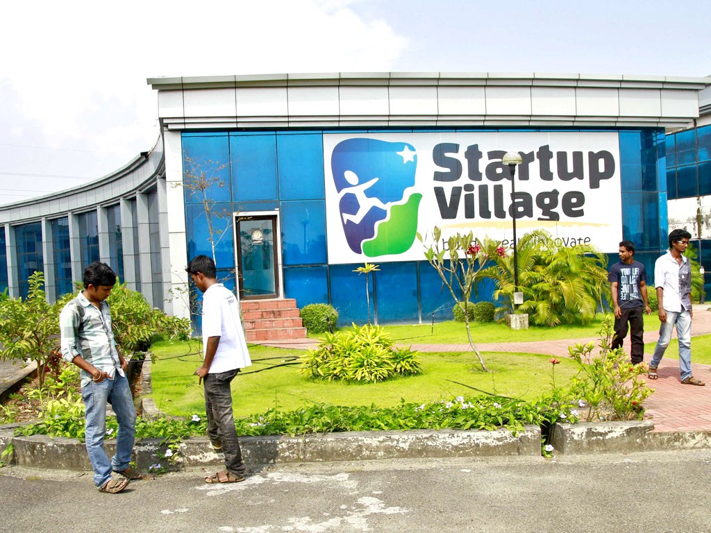 Employees outside the Startup Village in Kinfra High Tech Park in the southern Indian city of Kochi. © SIVARAM V/REUTERS
