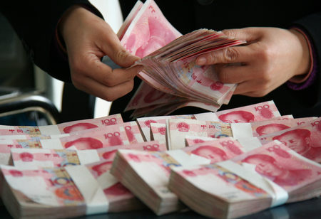 The Chinese currency reached a record high market share of 2.79 per cent in global payments for the month [Xinhua]