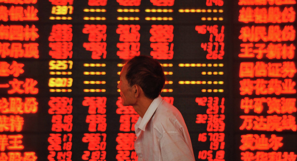 Amidst a gradual improvement in mainland China’s financial situation the Chinese financial markets regulator abandoned one of its most notorious restrictive rules, a ban on brokerages selling more stock than they buy. © AFP 2015/ STR