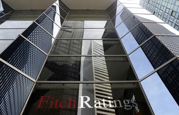 The revision of outlooks reflects profitable performance of both banks "despite larger credit losses and higher funding costs," Fitch said. © EPA/ANDREW GOMBERT