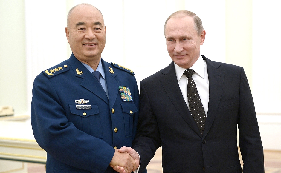 Putin with Vice Chairman of China’s Central Military Commission Xu Qiliang at the Kremlin. ©Xinhua