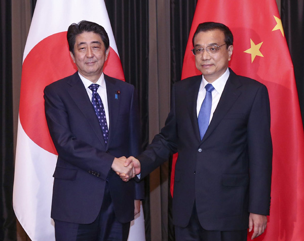 File Photo: Chinese Premier Li Keqiang with Japanese Prime Minster Shinzo Abe [Xinhua]
