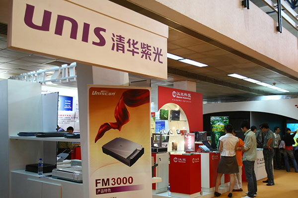 The stand of Unisplendour Corp Ltd, a listed company under Tsinghua Unigroup Ltd, at an international technology expo in Beijing. [Photo/China Daily]