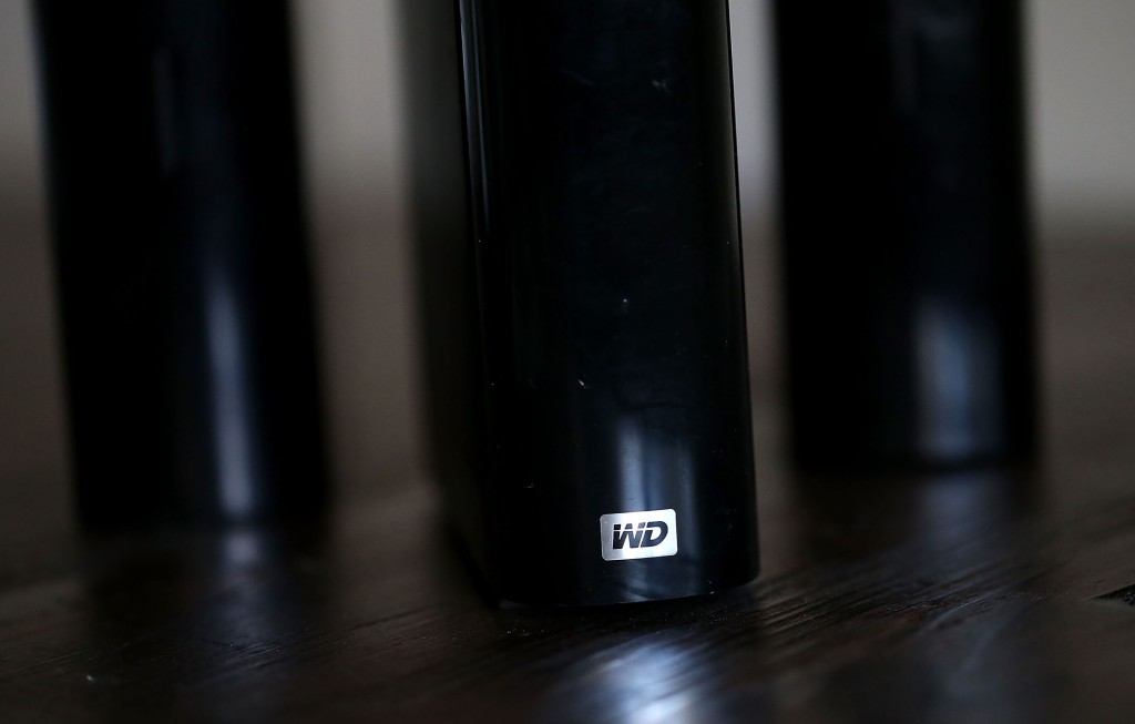 SAN ANSELMO, CA - OCTOBER 21:  In this photo illustration, the Western Digital logo is displayed on an external hard drive on October 21, 2015 in San Anselmo, California. Computer data storage company Western Digital announced plans to acquire flash memory storage maker SanDisk for $19 billion.  
