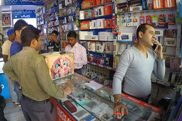 Vivo Communication Technology Co Ltd smartphones are sold together with other global brands at an electronics store in New Delhi.