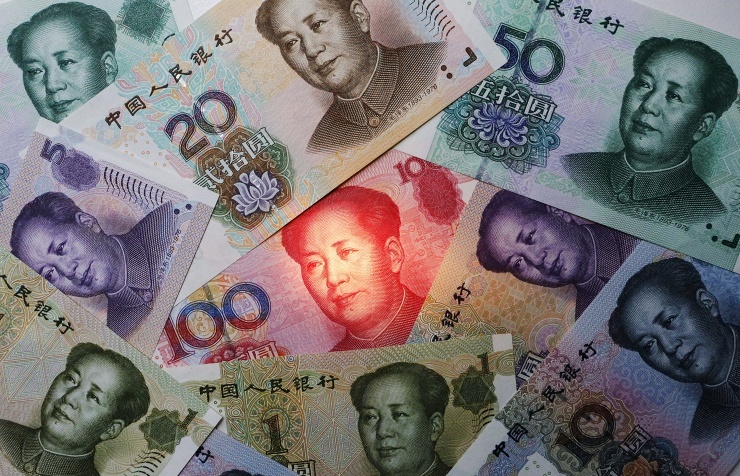 The Chinese yuan follows the US dollar, euro, pound and Swiss franc. © AP Photo/Andy Wong