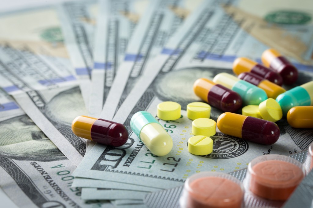 Close up of pills/drugs on US dollar