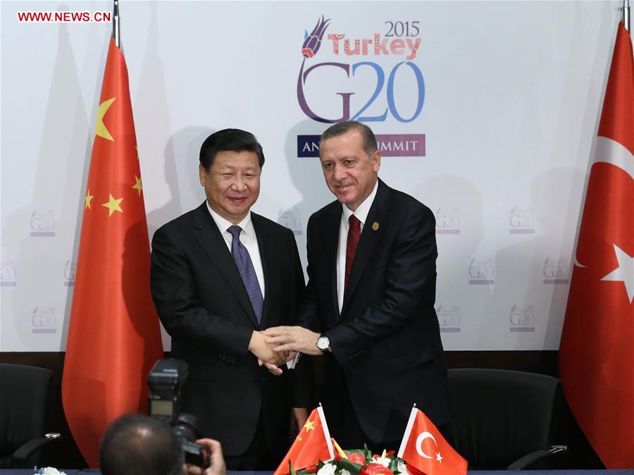 President Xi Jinping (L) shakes hands with his Turkish counterpart Recep Tayyip Erdogan in Antalya, Turkey, Nov 14, 2015. © Xinhua 