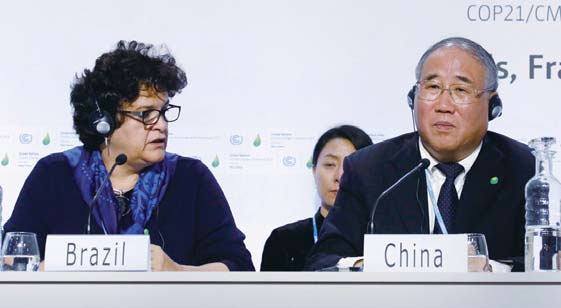 Brazil's Izabella Teixeira, minister for environment, and Xie Zhenhua, China's special representative for climate change, at COP21 on Dec 8. © Jacky Naegelen / For China Daily