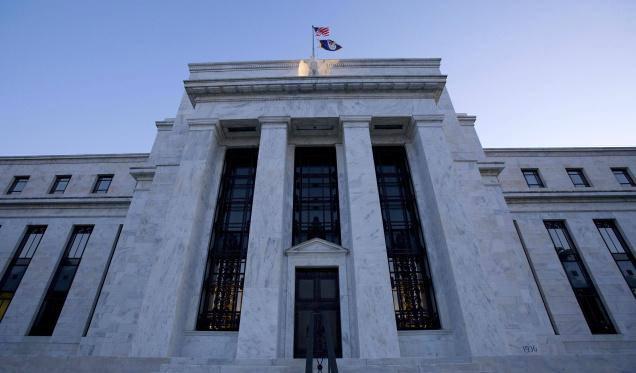File photo of the headquarters of the Federal Reserve Bank, seen at sunrise in Washington.