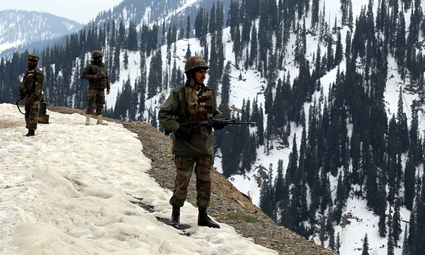 Indian army soldiers stand guard in Kashmir. The disputed territory will be included in renewed talks between Indian and Pakistani leaders. Photograph: AFP/Getty Images