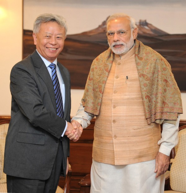 AIIB president-elect Jin Liqun meets Indian Prime Minister Narendra Modi, in New Delhi on January 11, 2016