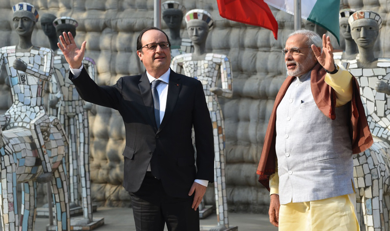 French President Francois Hollande meets with Modi.
