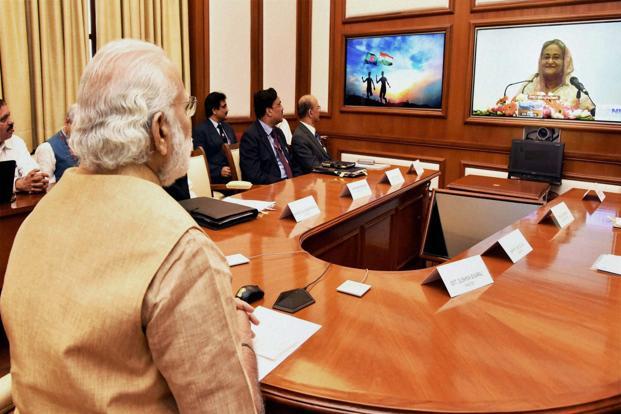 PM Modi dedicates the second cross-border transmission interconnection system between India and Bangladesh through video conferencing, in New Delhi on Wednesday. Photo: PTI