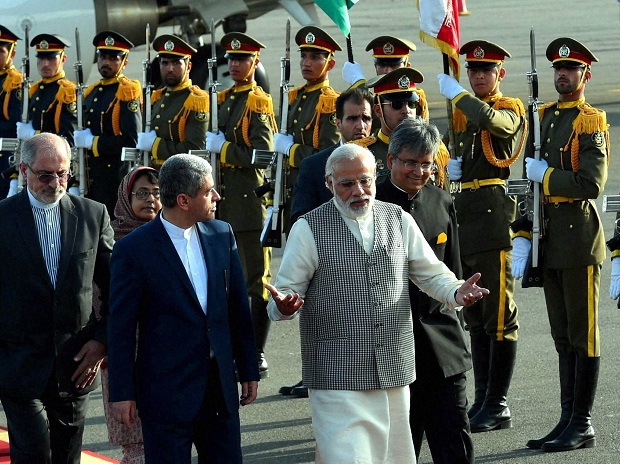 Prime Minister Narendra Modi with Ali Tayebnia, Iran's Minister of Economic Affairs and Finance on his arrival at Mehrabad airport in Tehran on his two days visit to Iran on Sunday. (PTI Photo)