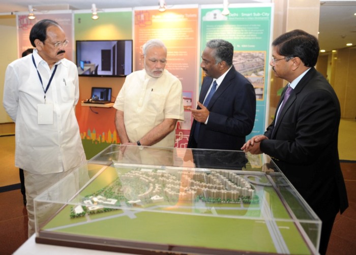 The Prime Minister, Shri Narendra Modi being briefed about the Smart Cities Mission, Atal Mission for Rejuvenation and Urban Transformation (AMRUT) and Housing for All Mission, in New Delhi on June 25, 2015.