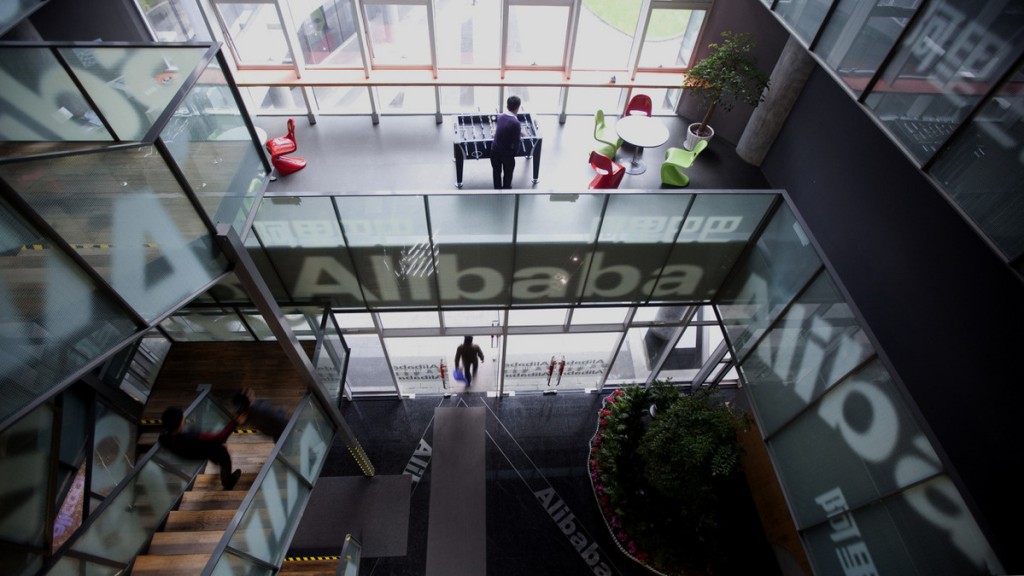 People walk through Alibaba headquarters in Hangzhou. Photographer: Nelson Ching/Bloomberg