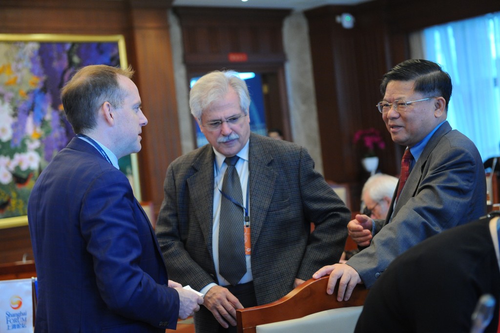 A. J. Nichols (lift), Ambassador Castro Neves (middle), and Ambassador Chen Duqing (right)