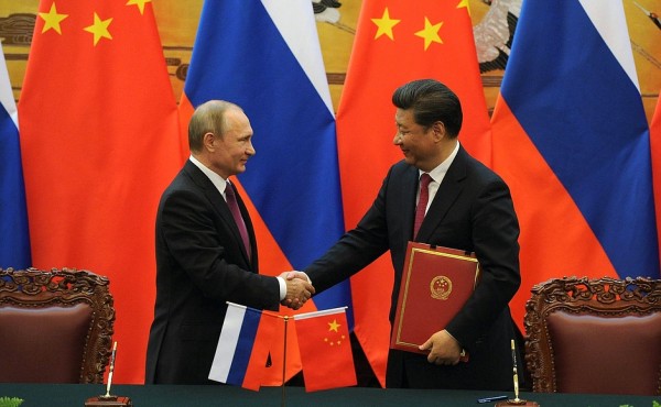 Putin and Xi witnessed signing of deals following talks in Beijing on 25 June 2016 [Image: PPIO]