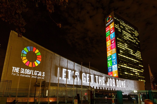 Massive projections on Sustainable Development Goals are seen on the north facade of the Secretariat building, and west facade of the General Assembly building at the United Nations headquarters in New York, the United States, Sept. 22, 2015 [Xinhua]