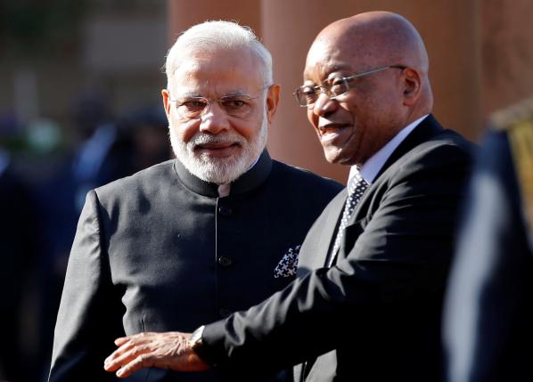 South Africa's President Jacob Zuma gestures next to India's Prime Minister Narendra Modi (L) during his state visit at the Union Buildings in Pretoria, South Africa July 8, 2016. REUTERS/Siphiwe Sibeko