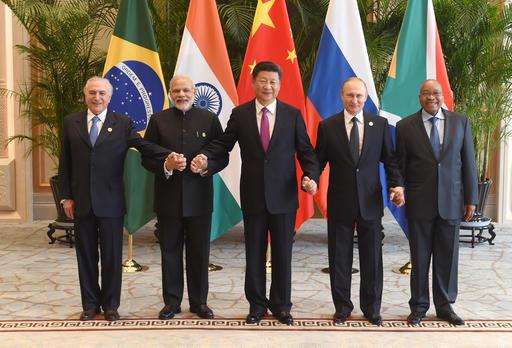 Brazilian President Michel Temer, Indian Prime Minister Narendra Modi, Chinese President Xi Jinping, Russian President Vladimir Putin and South African President Jacob Zuma for a group photo at the West Lake State Guest House in Hangzhou, China, Sunday. Photo: AP