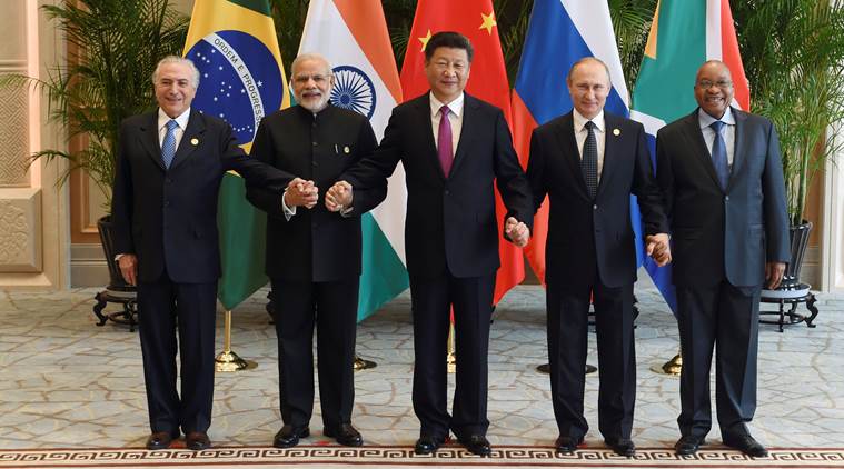 Chinese President Xi Jinping (C) takes a group photo with Indian Prime Minister Narendra Modi (2nd L), Brazil's President Michel Temer (L), Russian President Vladimir Putin (2nd R) and South Africa's President Jacob Zuma at the West Lake State Guest House ahead of G20 Summit in Hangzhou, Zhejiang province, China, September 4, 2016. REUTERS/Wang Zhao/Pool TPX IMAGES OF THE DAY