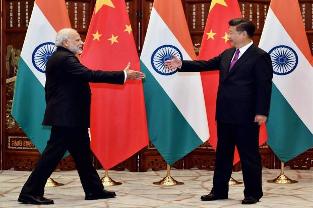Indian Prime Minister Narendra Modi with Chinese President, Xi Jinping before a bilateral meeting in Hangzhou, China. Photo: PTI