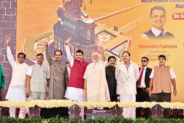 Prime Minister Narendra Modi with Maharashtra CM Devendra Fadnavis and Shiv Sena chief Uddhav Thackeray at a public meeting in Mumbai on Saturday. Photo: Aniruddha Chowdhury/Mint