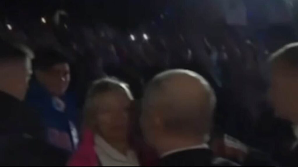 Smiling Putin enjoys a kiss from female admirer after his former friend Prigozhin's plane explodes - as the Russian leader shows no sign of misery