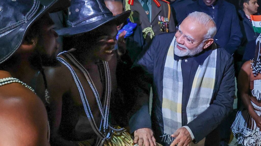PM Modi receives traditional welcome at Namibia, tries his hand at playing local drums